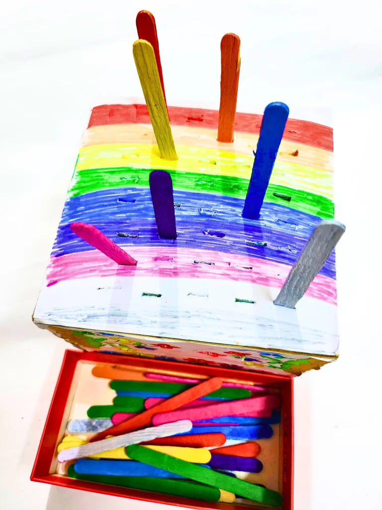 DIY toddler color sorting activity with rainbow box and popsicle